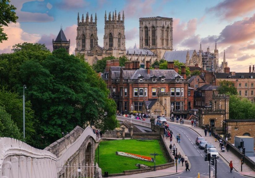 The city of York, its medieval wall and the York Minster at sunset